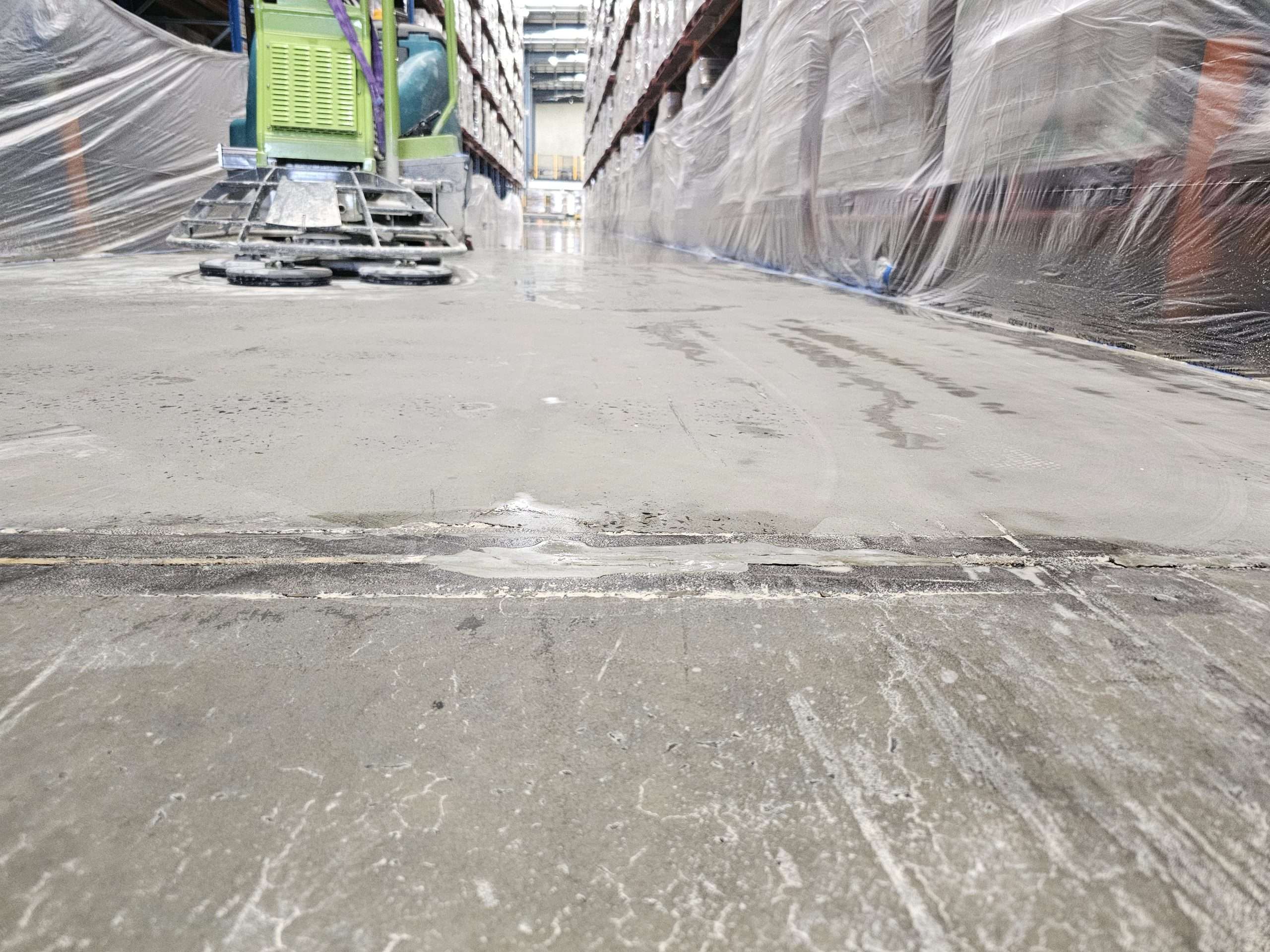 Badly damaged warehouse before joint reconstruction
